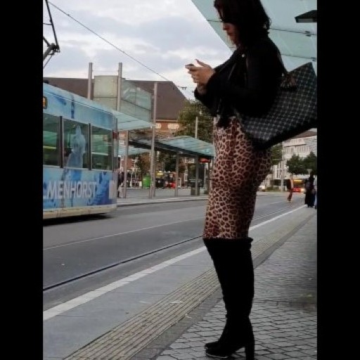 Candid girl in leopard leggings