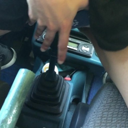 Petite girl fucks a car's gear stick / gearshift, but it's way too big for her...