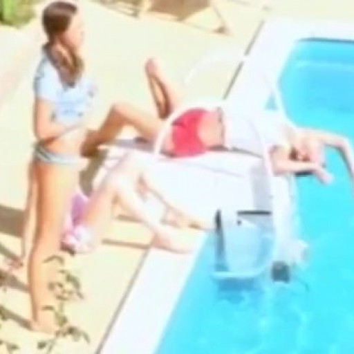 Three naked girls at the pool
