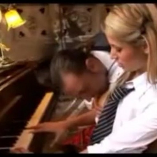Pretty blonde Regina Ice on piano forte