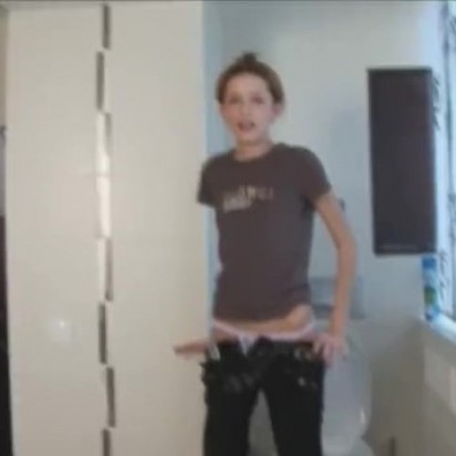 Extremely cute slim girl peeing