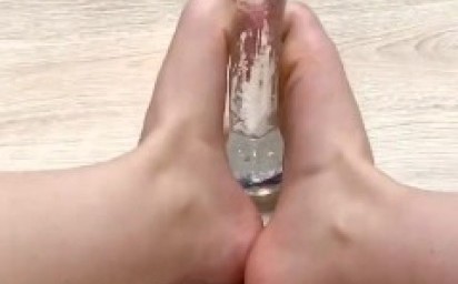 Masturbating the dildo with my foot and moaning