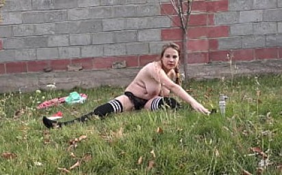 Anal-clitoral orgasm instead of boring fitness outdoor. A girl in stockings shakes her big tits and masturbates a juicy 