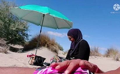 I shocked this muslim by pulling my cock out on the public beach, OMG her husband will be here soon