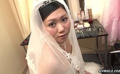 Japanese brunette Emi Koizumi fucked on wedding dress uncensored.