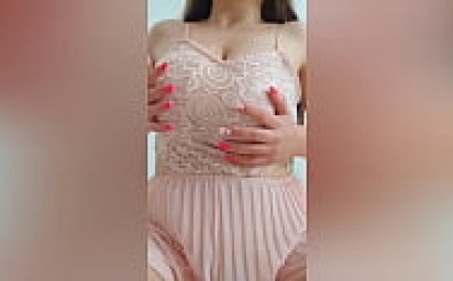 Young cutie in pink dress playing with her big tits in front of the camera - DepravedMinx
